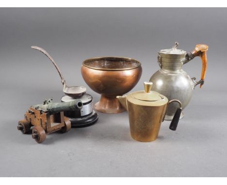 A bronze model cannon, a copper bowl, a pewter water jug, a camera tripod, a brass jug and a silver plated 'ladle' trophy