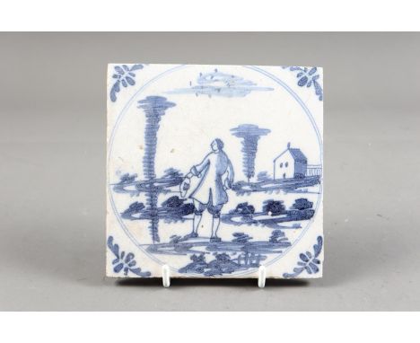An 18th century Bristol delft tile, man in landscape