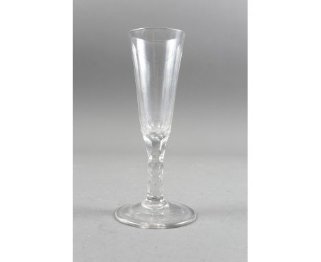 An 18th century champagne "flute" with faceted stem, 7" high