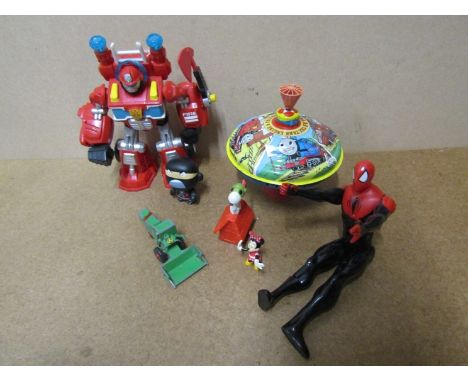 A vintage Thomas the Tank Engine spinning top, plastic Transformer toy etc 