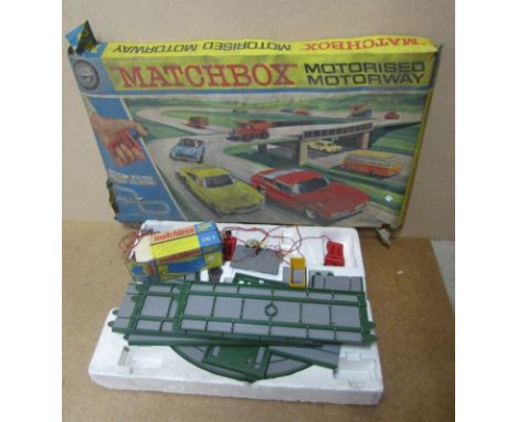 A Matchbox M-2 motorized motorway and matchless 10 volt powder unit 