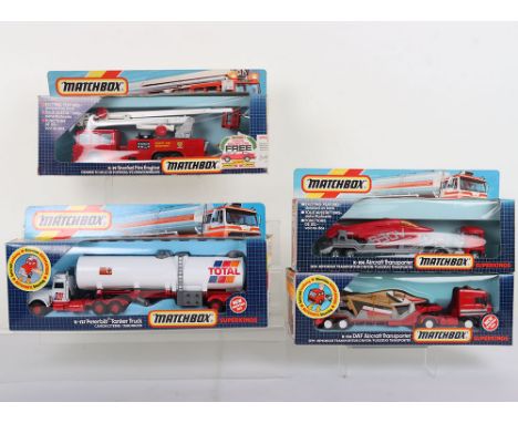 Four Matchbox Superkings, K-39 Snorkel Fire Engine, K-106 Scammell Aircraft Transporter, red cab, silver trailer, K-127 Peter