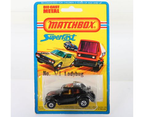 Matchbox Lesney Superfast Blisterpack Model, England: MB-31 Volks-Dragon with BLACK LADYBUG body, Flames &amp; Beetle prints,