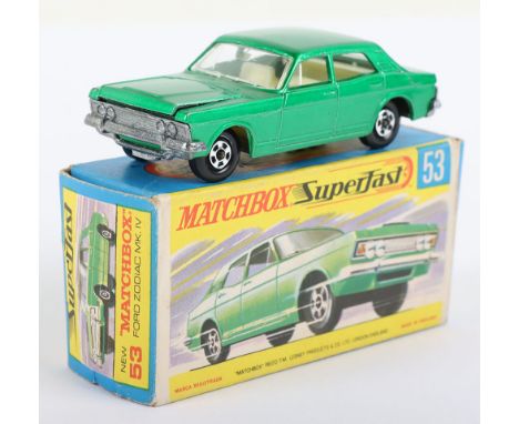 Matchbox Lesney Superfast Boxed Model, England: MB-53 Ford Zodiac with DARK Green body and THIN wheels, unpainted base, model