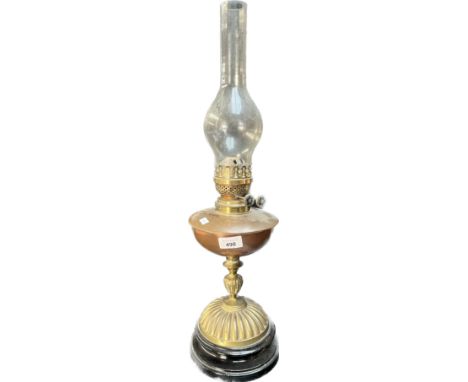 Antique brass and copper paraffin lamp with glass funnel. [62cm high] 