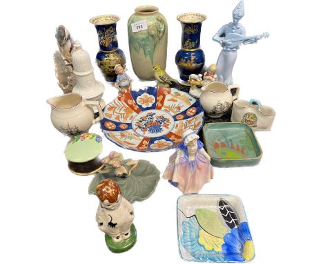 A Collection of porcelain collectables; Royal Doulton figurine, Carlton ware pagoda design vases, Goebel woodpecker figure, J