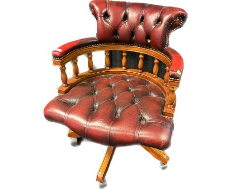Chesterfield captains chair, covered in an oxblood leather with button detail throughout [80x62.5x69cm] 