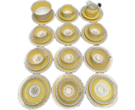 Vintage Tuscan Yellow, white and gilt floral design tea service. 