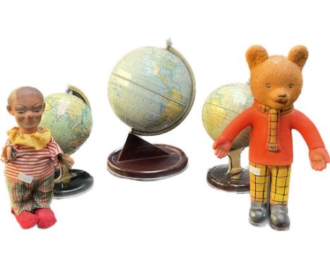 Vintage children's toys; Three tin plate world globes- two by Chad Valley, Clock work clown figure and Hard plastic Rupert th