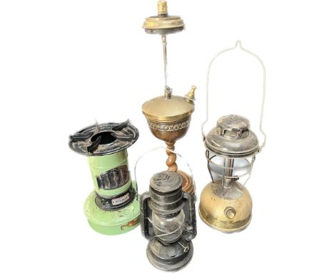 Four various paraffin lamps; Vintage Valor Minor stove, Chalwyn storm lamp, Tilley storm lamp and one other. 