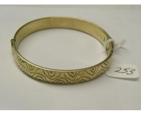 Engraved rolled gold bangle      