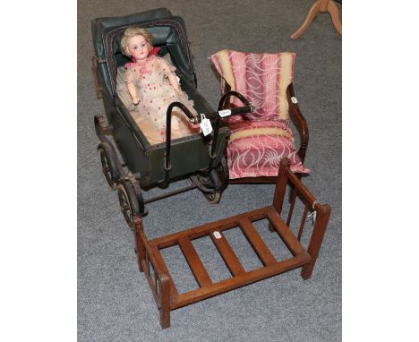 Childs mahogany commode chair, oak dolls bed and a childs carriage built pram, Armand Marseille 390 bisque head doll with blo