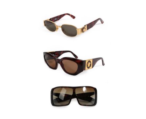 Two Pairs of Gianni Versace Sunglasses, with tortoiseshell and gilt mounted frames, Another Pair of Versace Sunglasses, with 