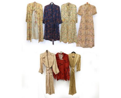 Early 20th Century Chinese Brocade Dressing Robes and Others, including two similar robes on a gold and silver green ground w