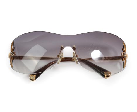 Pair of Louis Vuitton Lily Pattern Rimless Sunglasses, with cut out petals to the side of the frames, gilt metal mounts to th