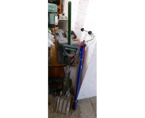 Garden tools and extending handles, together with a 110v Bosch jigsaw and 110v hammer drill