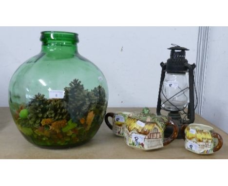 A tiller lamp, Cottage ware 3-piece tea service and large green glass vessel