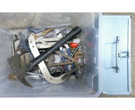 A metal toolbox, together with box of tools including fireman's axe, vice, spanners etc