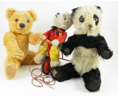 Chiltern ‘Bear on a Trike’ English 1950’s, designed by Pam Howell’s, the white cotton plush bear in red jacket and yellow tro