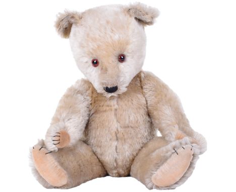 Large Chiltern Hugmee Teddy bear, English 1950’s, the light brown mohair bear with orange eyes, black stitched nose, mouth an