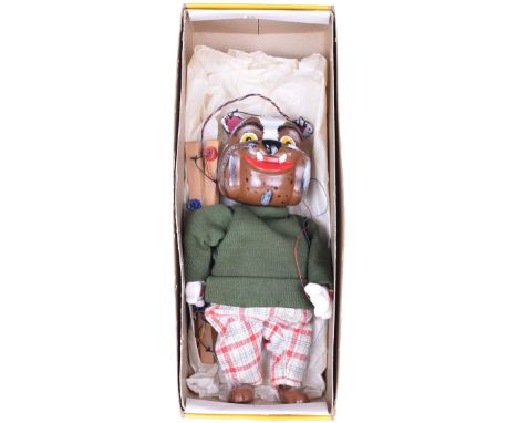 Pelham Puppet Bulldog, 1963, carved painted head, hands and feet, dressed, yellow box, excellent condition. 