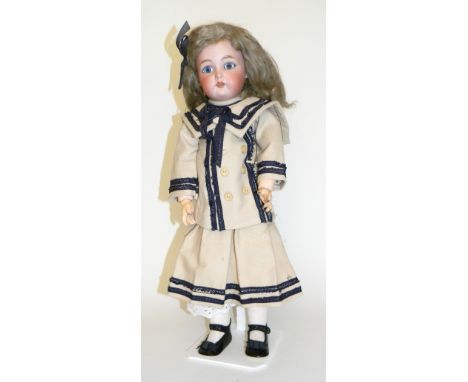 Simon & Halbig/K&R bisque head doll, German circa 1910, with fixed blue glass eyes, open mouth, upper teeth, pierced ears and