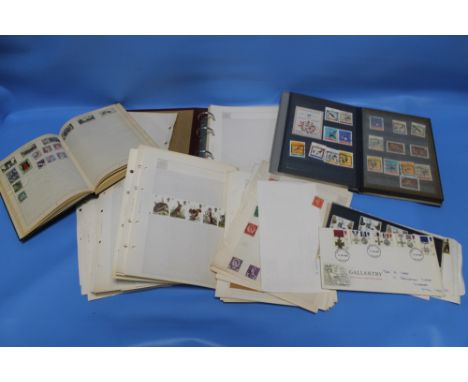 A COLLECTION OF VARIOUS WORLDWIDE STAMPS, loose and in albums, to include first day covers