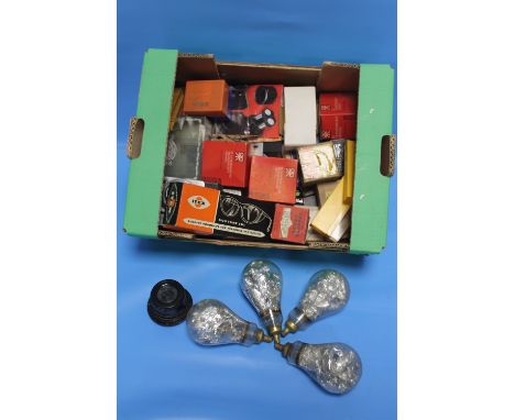 A BOX OF ASSORTED CAMERA ACCESSORIES, LIGHT BULBS ETC.