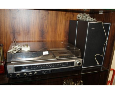 A PHILIPS RECORD PLAYER TOGETHER WITH TWO SPEAKERS AND A SMALL COLLECTION OF RECORDS