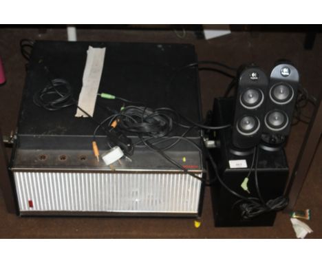 A BUSH RECORD PLAYER WITH GARRARD TURNTABLE and paperwork together with a Logitech gaming speaker set X-230
