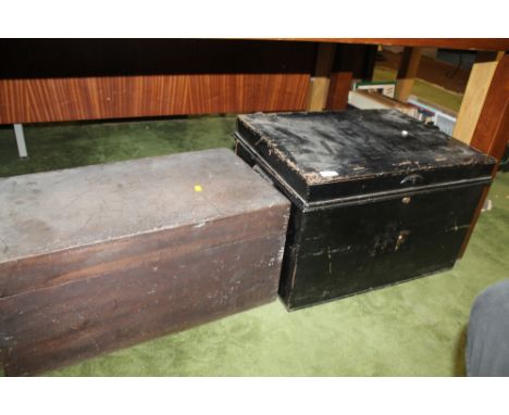 A METAL TRUNK TOGETHER WITH A WOODEN TRUNK