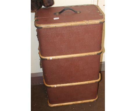 A WOOD BOUND PACKING TRUNK