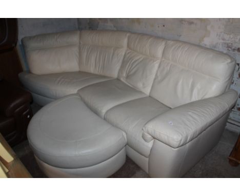 A CREAM LEATHER CORNER SOFA