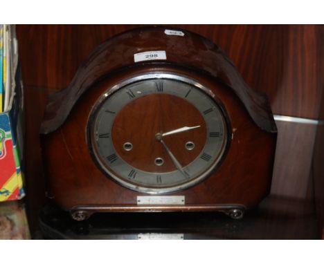 AN ALEXANDER CLARK MANTEL CLOCK