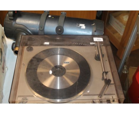 A PHILLIPS RECORD PLAYER TOGETHER WITH A CELESTRON TELESCOPE