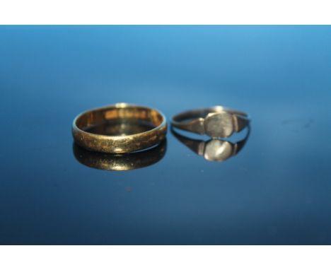 A 22 CT AND A 9 CT GOLD RING  (2)