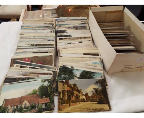A mixed selection of assorted postcards to include scenic, architectural, Naval Ships, etc 