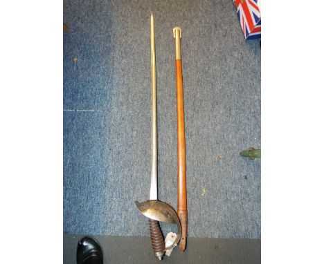 An English Officer's sword and scabbard the blade engraved GR with cipher, warranty crest and foliate panels, the full basket