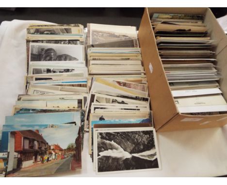 A mixed selection of assorted postcards to include scenic, architectural etc 