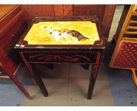 A mid-20thC school desk, ebonised with hinged top hand painted with hunting dogs 