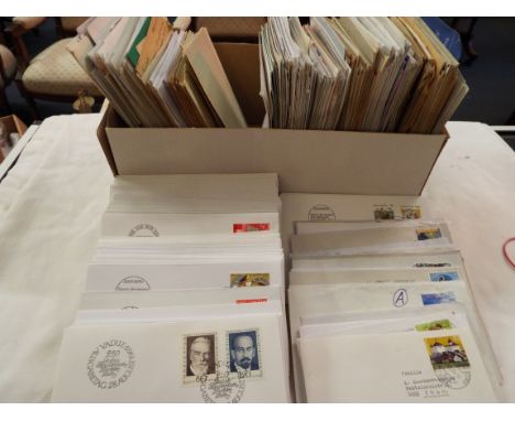 A large selection of Swedish stamped envelopes and first day covers  