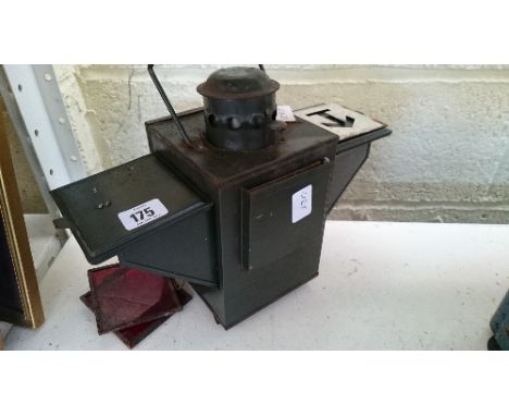 A WWII German green painted metal navigational light.