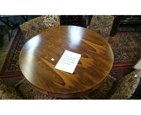 ROBERT HERITAGE (for Archie Shine): A mid 20th century Brazilian rosewood 'Hamilton' drum dining table with four integral dra
