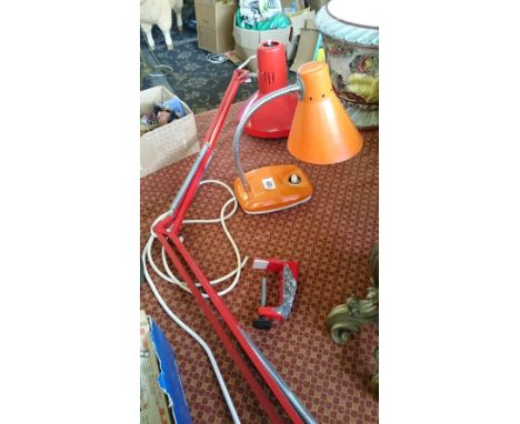A red painted wall Ledu angle poise light with original label to interior together with a small orange painted desk lamp with