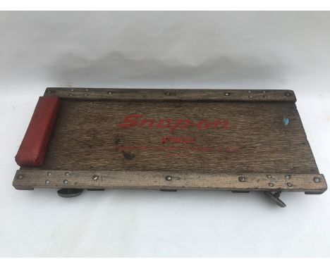 A Snap-On Tools workshop creeper.