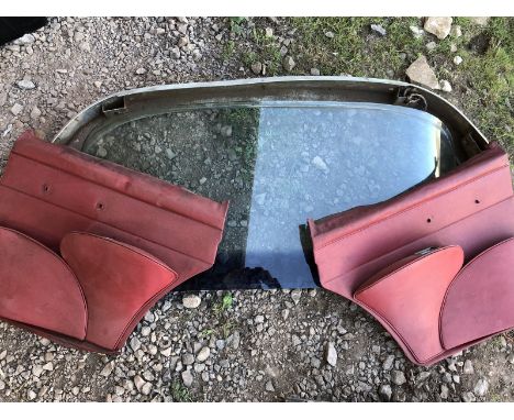 A rare Rover P6 Sundym laminated windscreen, two interior rear door cards, and a rear bumper to suit Jaguar.