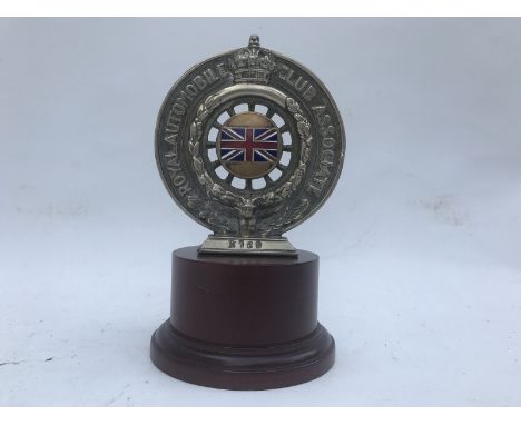 An RAC Associate car badge with Union Jack (type 2) centre, on mounting bracket, nickel 1908 pattern, no. N768.