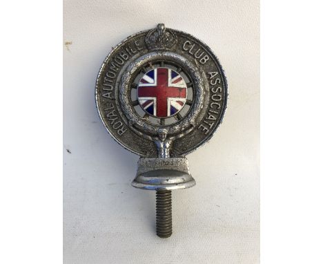 An RAC Associate car badge with enamel centre.