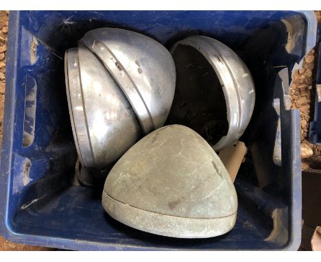 A box of assorted Lucas lamp parts. 