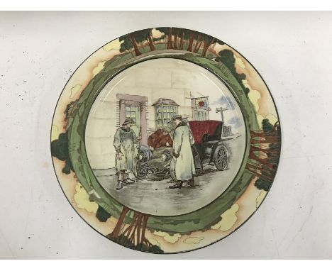 A Royal Doulton circular motoring related plate depicting two motorists with their veteran motor car and a passer-by, no. D60